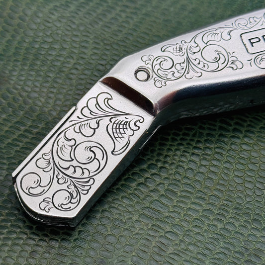 Hand Engraved Personna Carpet Knife
