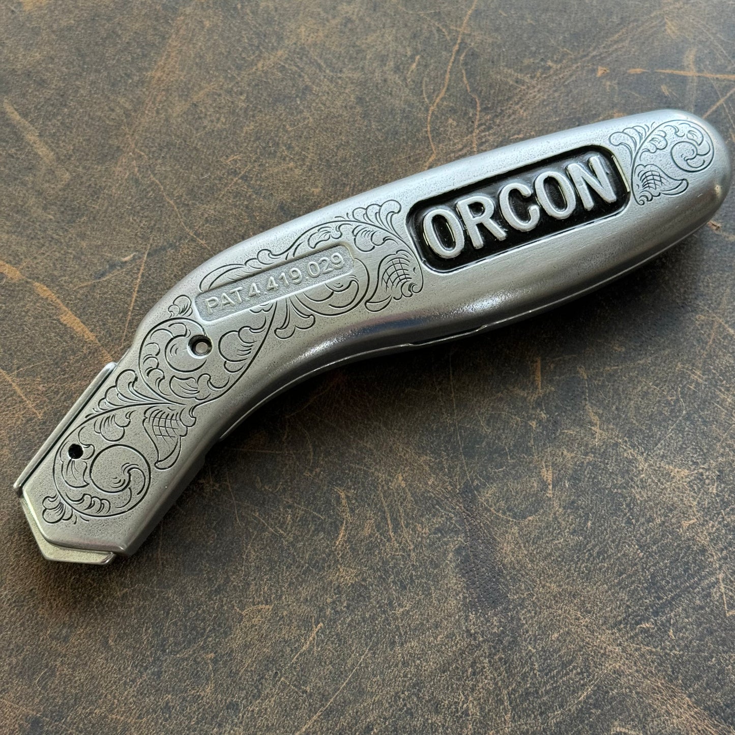 Hand Engraved Orcon Carpet Knife